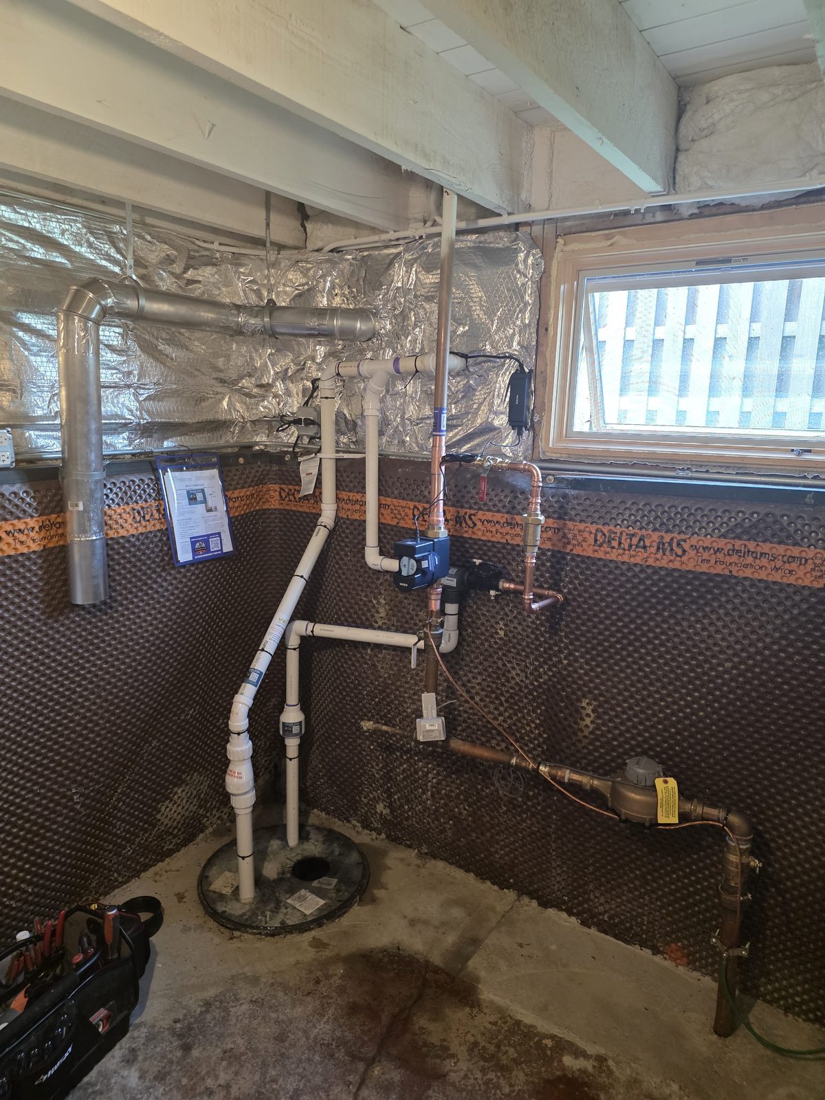 Pristine basement plumbing installation by MDM